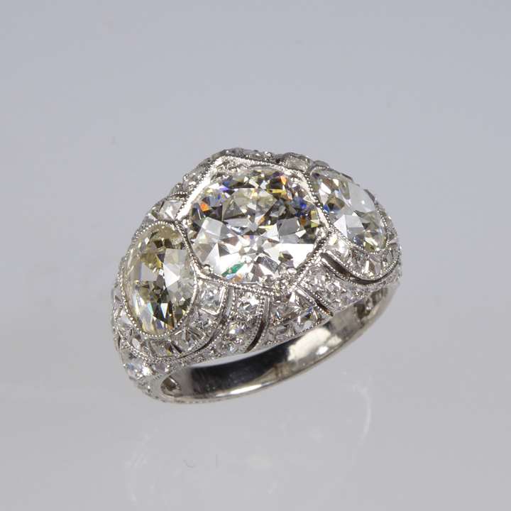 Early 20th century three stone diamond pierced cluster ring